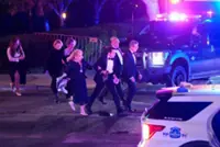 Trump safe after being rushed from White House correspondents dinner as attendees take cover