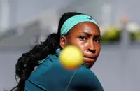 Tennis-Gauff battles through illness to reach Madrid Open last 16