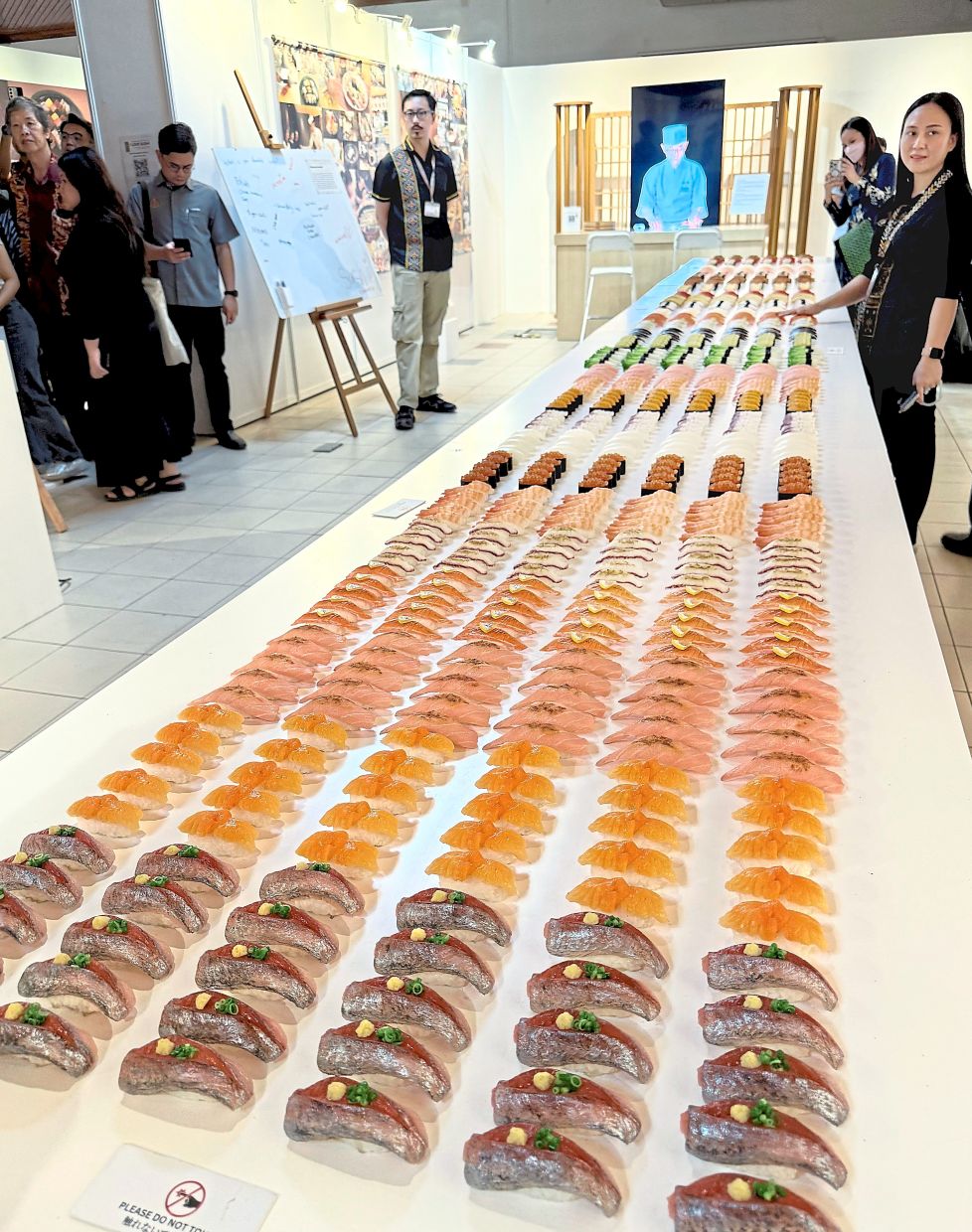 Different types of sushi on display.