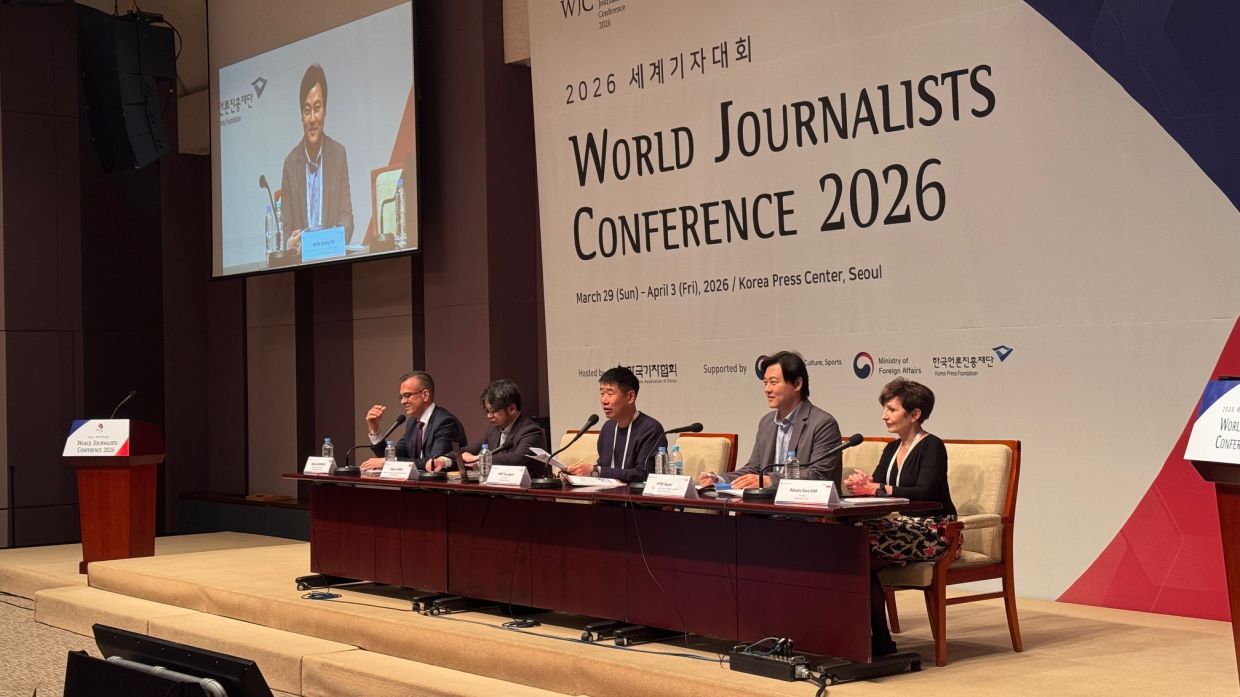 AI in focus: Speakers (from left) Union of Bulgarian Journalist board of directors member Martin Georgiev, Zheng, moderator Yonhap News Agency reporter Kim Tae-gyun, Woo and Kim. - WJC 2026
