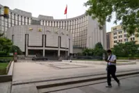 China hits brakes on fiscal stimulus