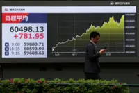 Japan's Nikkei closes above 60,000 for first time on earnings optimism