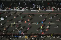 Athletics-London Marathon breaks record for largest number of finishers