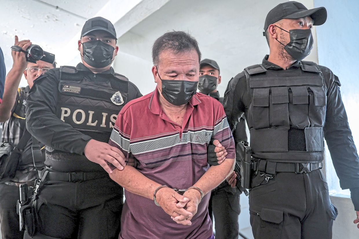 A 71-year-old farmer has been charged at the Magistrate’s Court Kota Tinggi over a triple murder at a restaurant.