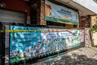 Indonesian police charge 13 in daycare abuse scandal