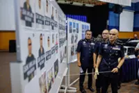 Selangor cops bust online gambling ring, scam call centre in separate raids