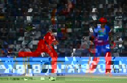 Cricket-Hazlewood headlines rare bowlers' day in IPL as Bengaluru crush Delhi