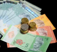 Ringgit closes higher vs US dollar, regional currencies