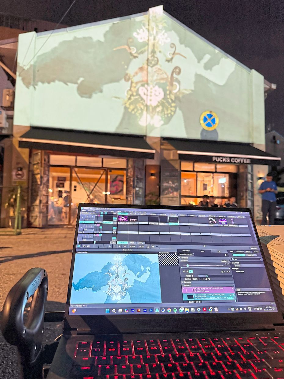 Warung Terang animates downtown KL’s laneways, bringing local market scenes to life through projection mapping and digital storytelling. Photo: Filamen