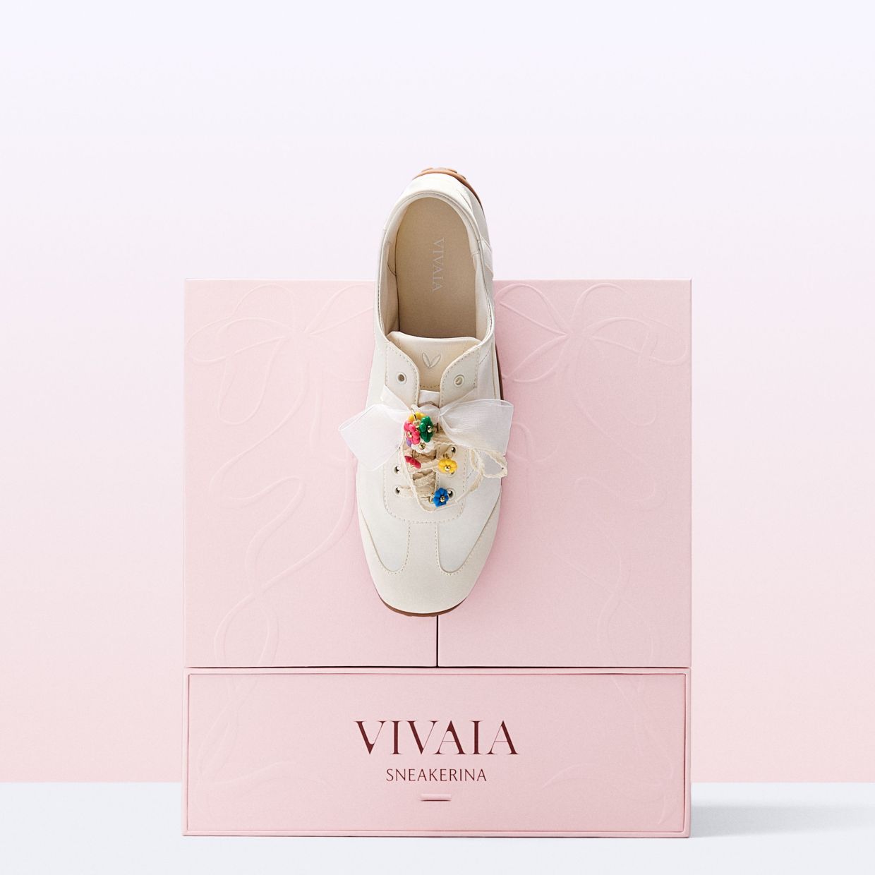 Vivaia Sneakerina Music Box featuring customisable shoelaces and charms.