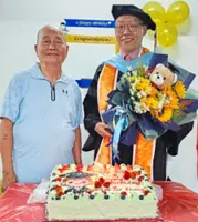 Deaf teacher has a bigger goal after obtaining PhD