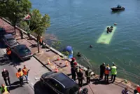 People rescued after bus falls into river Seine near Paris