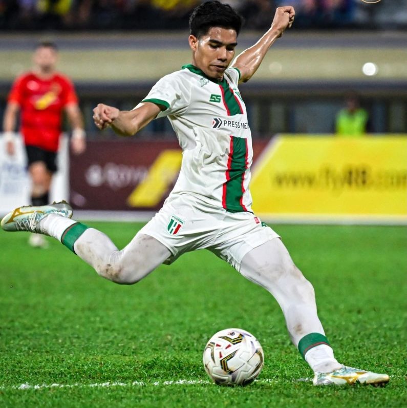 Getting his kicks: Kuching City’s Ahmad Danial Asri in action against Brunei last week. — Kuching City.