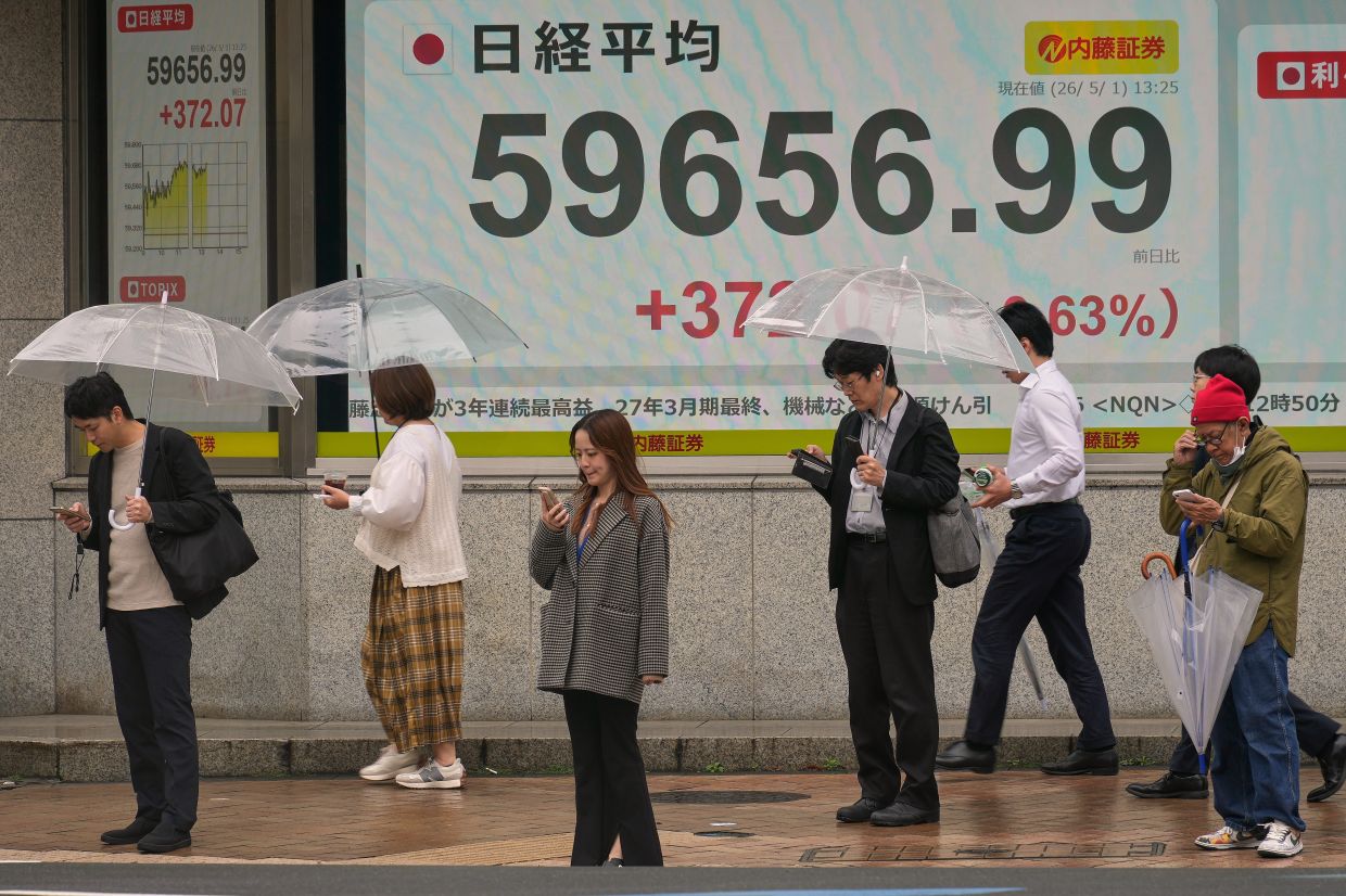 The Nikkei closed 0.38% higher at 59,513.12. It, however, dipped 0.3% for the week, snapping a third straight week of gains.
