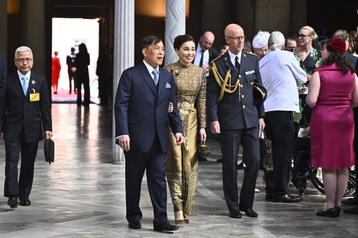 King Maha Vajiralongkorn and Queen Suthida of Thailand attend a lunch at the City Hall to mark the celebrations of King Carl Gustaf's 80th birthday in Stockholm, Sweden. -- Photo: Christine Olsson/TT via AP