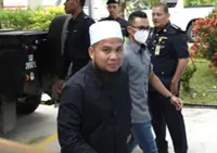 Ebit Lew told to enter defence on 11 charges