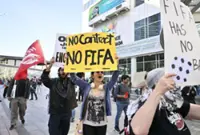 Soccer-Advocates for homeless, hotel workers rally outside FIFA Congress in Vancouver