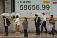 Japan's Nikkei rises on tech rally, stronger yen lifts JGBs
