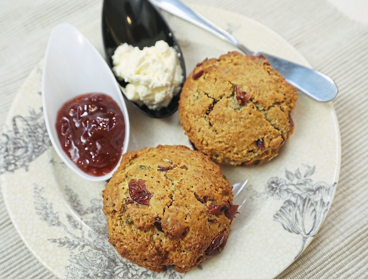 Although traditionally served with clotted cream and jam, scones here are usually substituted with whipped cream. — SAMUEL ONG/The Star