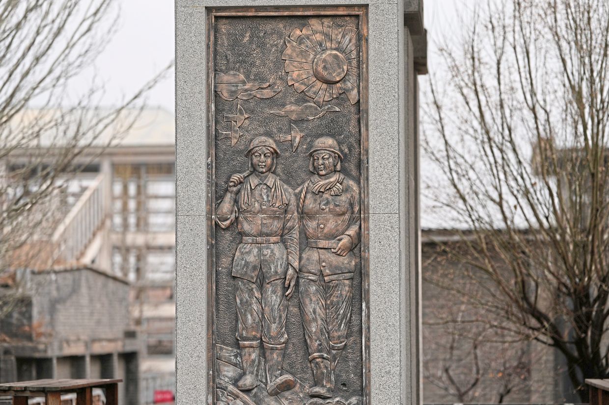 A statue depicting female miners at the Jinhuagong National Mine Park. — AP