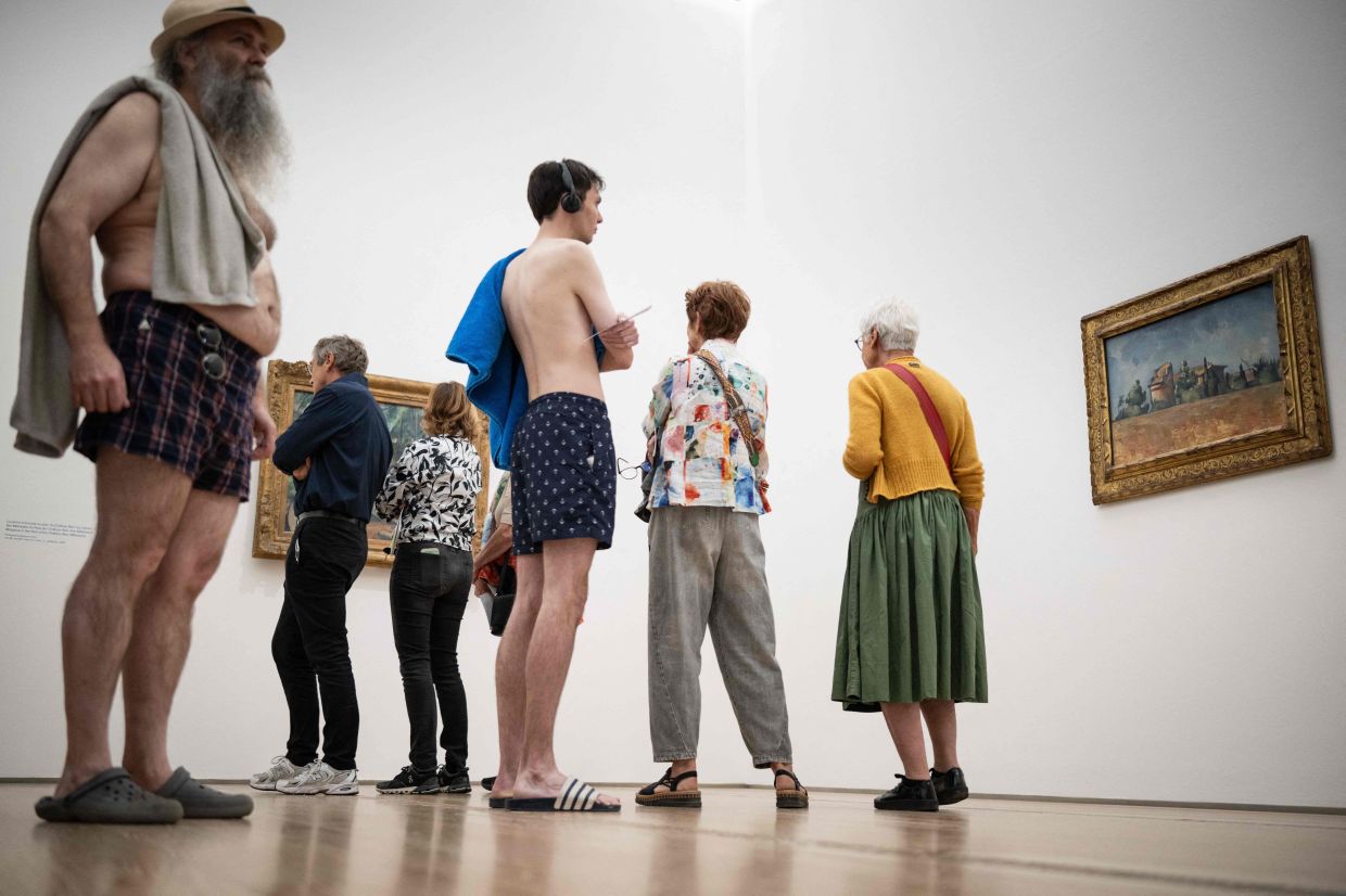 To encourage museum-goers to get into the spirit of things, those arriving in swimming costumes can avoid the 25 Swiss francs (RM127) entry fee. Photo: AFP 