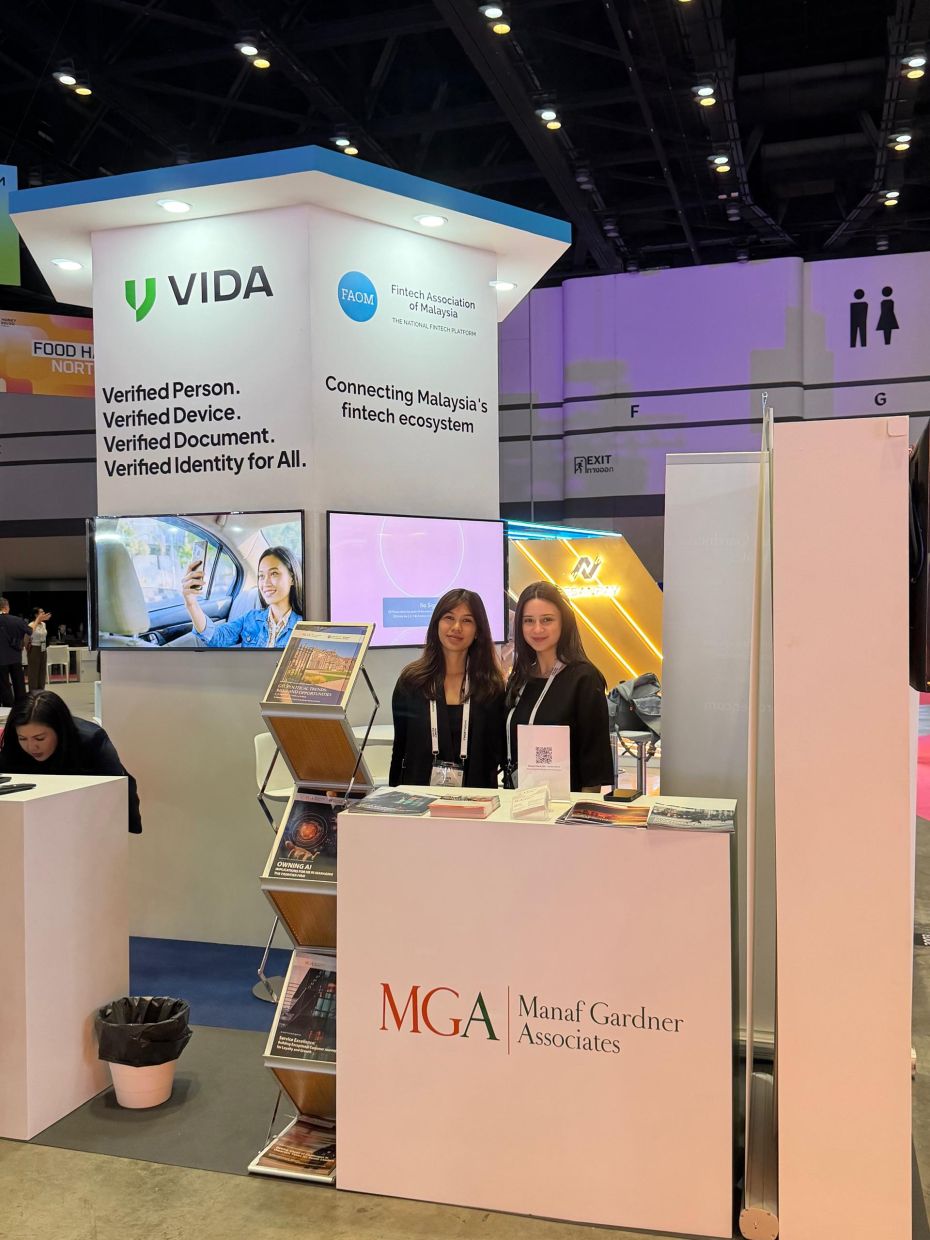 Junita Rashid, Director of Partnerships at Manaf Gardner Associates, with Dr Iman Lim, Manaf Gardner Associate (Corporate Wellness), at the firm’s booth located at the Malaysian Pavilion (curated by PayNet Malaysia) during Money20/20 Asia.