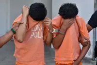Body with 61 stab wounds: Elderly woman among two more held