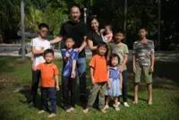 Singaporean couple prepared their seven children for the arrival of their ‘special sister’