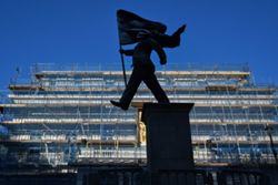 Banksy confirms a new statue in London of a man blinded by a flag is his work