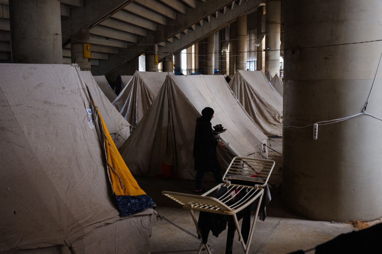 The experience of displaced Lebanese, here sheltering in tents pitched inside the Camille Chamoun Sports City stadium in Beirut, has freaked out many Malaysians, who are wondering: where can we go if it was us? —AFP