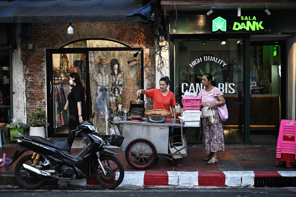 One of Bangkok's busiest tourist areas, the neighbourhood's steady flow of customers is worth the risk of city fines, Looknam, 45, said.