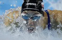 Swimming-American Walsh improves own 100m butterfly world record for third time in a year