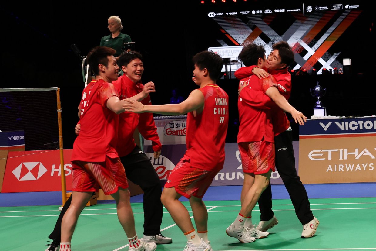 We did it: China celebrate after winning. - Bernama