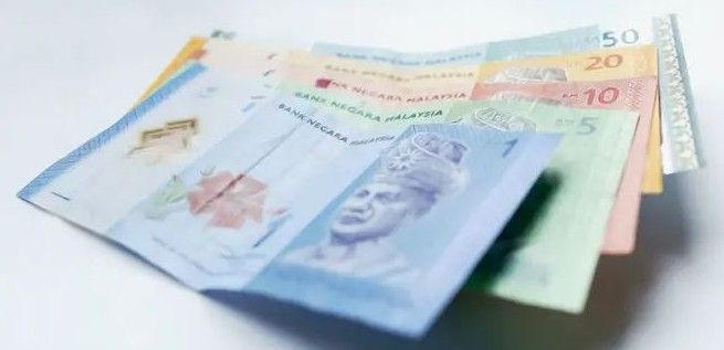 The ringgit was marginally lower against the US dollar at 3.9690/9740 last Thursday, compared with 3.9630/9670 at the end of the previous trading week.