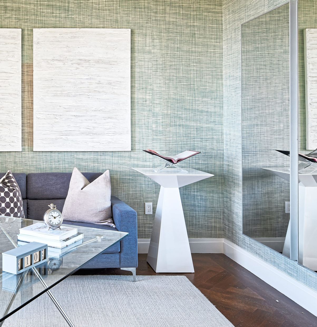 A lacquer pedestal helps to fill an empty space in a home office.
