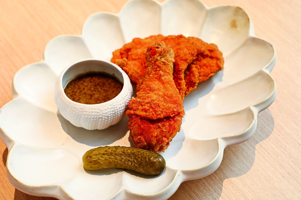 The eatery's fried chicken was made in homage to Zhe Xi's love of KFC.