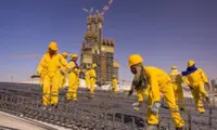 For foreign workers in the Mideast, risk from the Iran war collides with economic strain at home