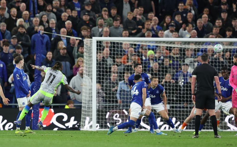 Soccer-Man City drop points in title race after shocking draw with Everton