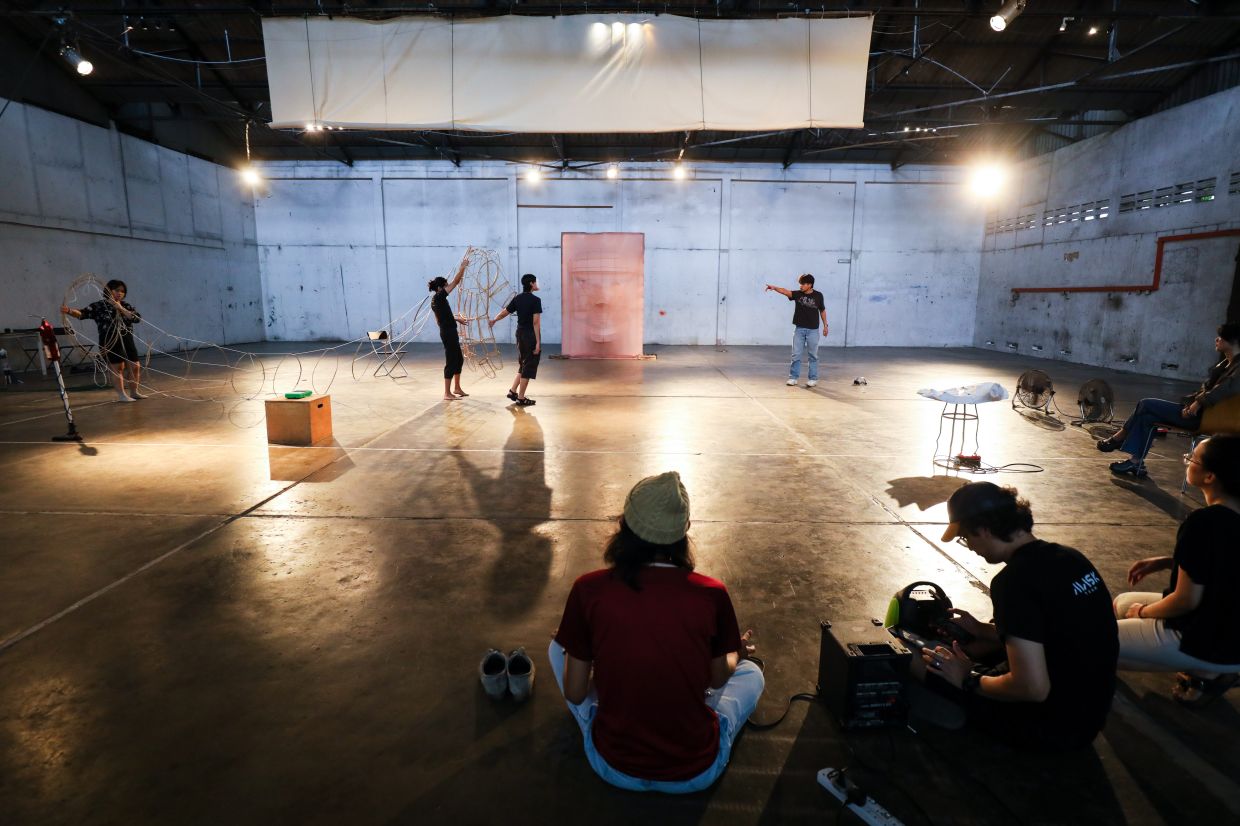 The play balances digital technology like 3D-printed masks, projection mapping and live coding with traditional, handmade rattan stagecraft. — LEONG WAI YEE/The Star