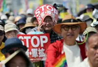 Fifty thousand people rally in Tokyo against revising pacifist Constitution