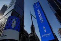 Crypto exchange Coinbase to cut about 14% of workforce in AI-driven restructuring