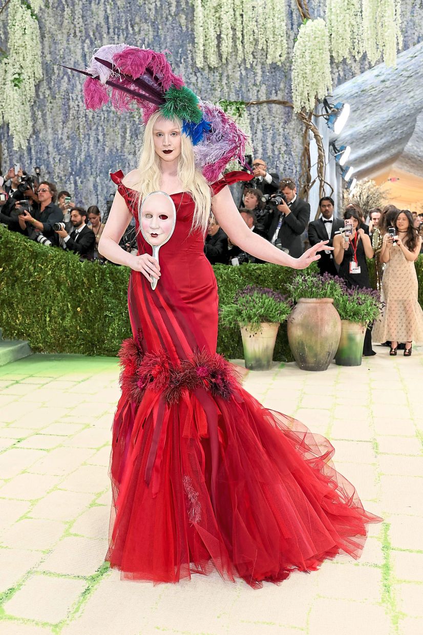 Gwendoline Christie is seen carrying her own face at the Met Gala, which is an actual artwork created just for the event. Photo: AFP