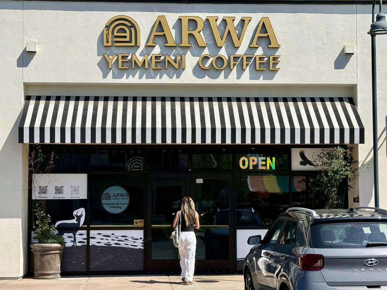 A customer enters Arwa Yemeni Coffee on April 6, 2026, in Sunnyvale, Calif. (AP Photo/Haven Daley) 