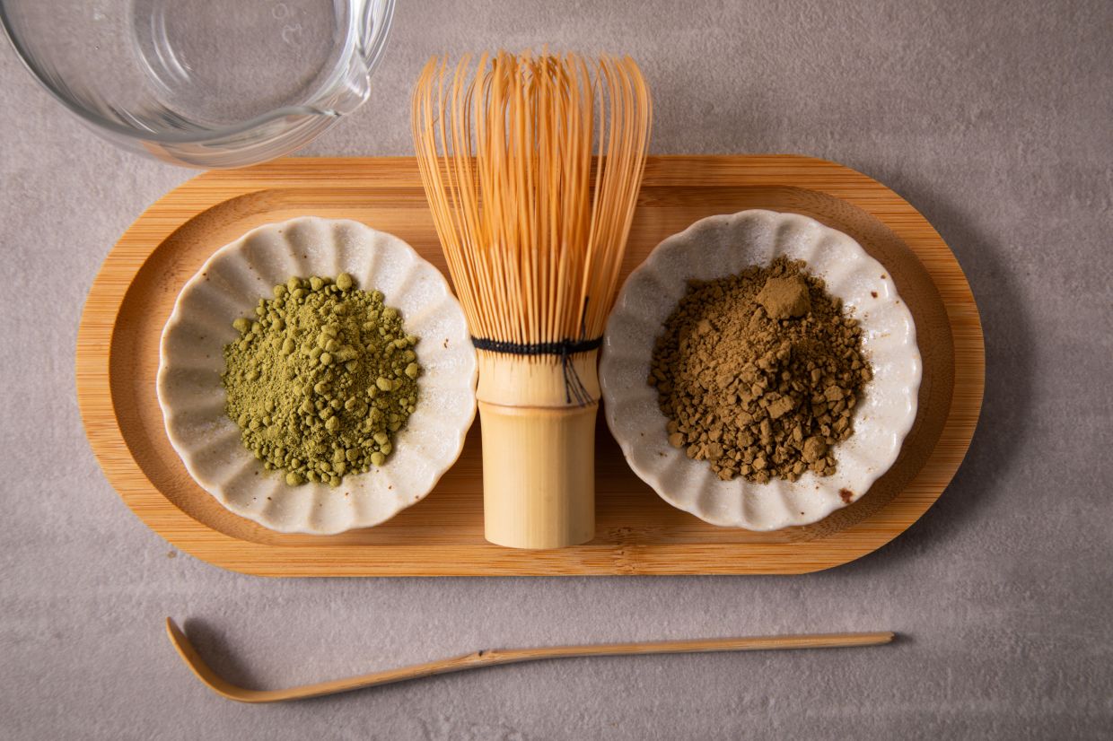 While matcha is made from young, shaded leaves and has a much stronger kick, hojicha is made from older leaves and stems, which are heavily roasted after being steamed.