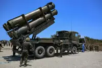 Japan fires missile in joint drill with US and allies in northern Philippines, facing South China Sea