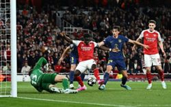 Soccer-Saka sends Arsenal past Atletico into Champions League final