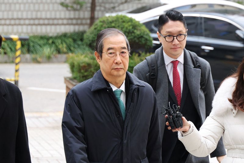 South Korea appeals court cuts jail sentence for ex-PM Han Duck-soo to 15 years