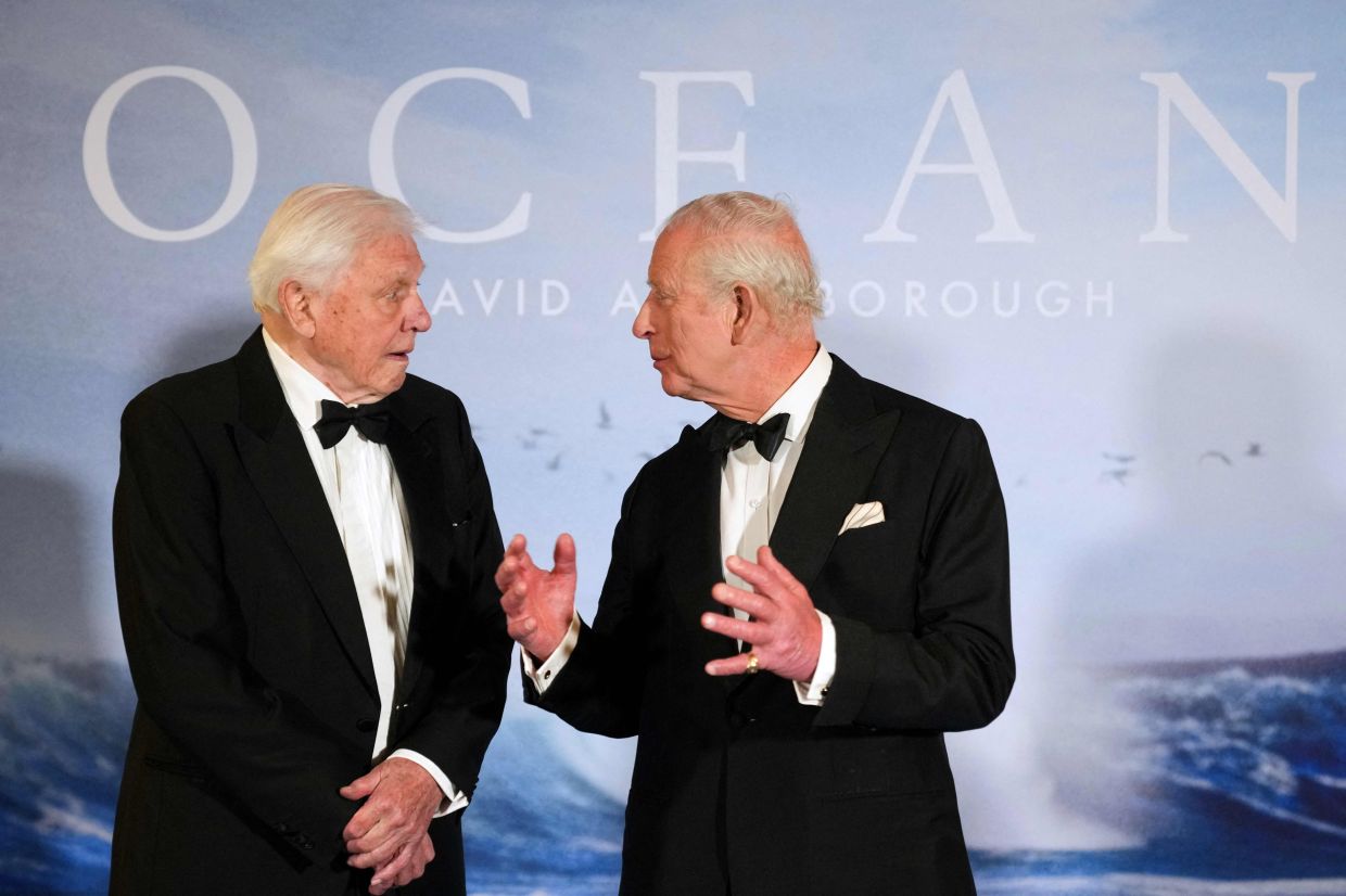  Britain's King Charles III (right) talks with British broadcaster and biologist David Attenborough upon his arrival to attend the premiere of 'Ocean With David Attenborough' at the Royal Festival Hall, in London, on May 6, 2025. Photo: AFP