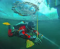 These scientists dive beneath Arctic and Antarctic ice to discover its secrets