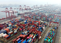 Chinese exporters 'numb' to US threats as Trump set to visit